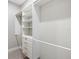 Organized walk-in closet with custom shelving and drawers for ample storage at 13552 Boatbill Ln, Port Charlotte, FL 33981