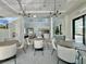 Inviting lounge area features modern lighting, comfortable seating, and a convenient kitchenette for residents to enjoy at 14057 Crutchfield Ct, Parrish, FL 34219