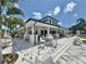 Stylish poolside bar area with ample seating, perfect for enjoying refreshments and socializing at 14057 Crutchfield Ct, Parrish, FL 34219