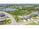 New community homes, pond and landscape in aerial view at 16139 69Th E Ln, Parrish, FL 34219