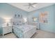 Stylishly furnished bedroom with a comfy bed, dresser, and a window allowing ample natural light at 21287 Sandal Foot Dr, Venice, FL 34293
