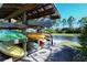 Canoe storage rack with colorful kayaks and canoes, providing easy access to water adventures at 21287 Sandal Foot Dr, Venice, FL 34293
