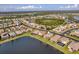 An aerial view of the houses and lakes in this sprawling Primary planned community at 2212 Weaver Bird Ln, Venice, FL 34292