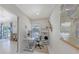 Bright home office with a view of the backyard and a world map at 2220 Palm Ter, Sarasota, FL 34231