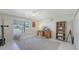 Large home office with lots of light and views of the front yard at 2220 Palm Ter, Sarasota, FL 34231