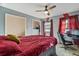 Comfortable bedroom with closet, ceiling fan, and two windows at 2272 Palomar St, North Port, FL 34287
