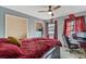 Comfortable bedroom with closet, ceiling fan, and two windows at 2272 Palomar St, North Port, FL 34287