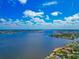 Waterfront home with mature trees, great views, and convenient access to bridge and coastal areas at 2305 Riverview Blvd, Bradenton, FL 34205
