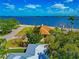 Stunning aerial view showcasing the home's proximity to the waterfront and lush surroundings at 2305 Riverview Blvd, Bradenton, FL 34205