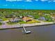 This waterfront property offers a private dock, mature landscaping, and a serene setting at 2305 Riverview Blvd, Bradenton, FL 34205
