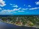 Stunning aerial view of waterfront home with a private dock at 2305 Riverview Blvd, Bradenton, FL 34205