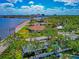 Scenic aerial view highlighting the property's location near the water and beautiful city skyline at 2305 Riverview Blvd, Bradenton, FL 34205