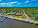 Waterfront home with private dock and lush landscaping at 2305 Riverview Blvd, Bradenton, FL 34205