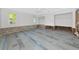Bright bedroom features natural light from windows and closet space at 2305 Riverview Blvd, Bradenton, FL 34205