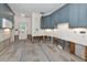 Kitchen with stylish blue cabinets, ready for renovation and personalization at 2305 Riverview Blvd, Bradenton, FL 34205
