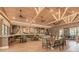 Bright community cafe with vaulted ceilings, communal tables, and cozy seating at 23261 Banbury Way # 501, Venice, FL 34293