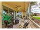 Charming screened lanai offering a delightful space for relaxation and outdoor living at 23261 Banbury Way # 501, Venice, FL 34293