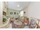 Cozy office with desk, seating area and vintage-style furniture with patterned rug at 23261 Banbury Way # 501, Venice, FL 34293