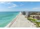 Condos next to a beach with aqua-blue water; a serene, coastal living experience at 2333 Gulf Of Mexico Dr # 1A2, Longboat Key, FL 34228