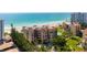 Coastal condominium with beach access offers an outdoor pool and resort-style living at 2333 Gulf Of Mexico Dr # 1A2, Longboat Key, FL 34228