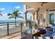 Stylish balcony with ocean and beach views provides outdoor comfort and built in grilling station at 2333 Gulf Of Mexico Dr # 1A2, Longboat Key, FL 34228