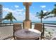 Balcony with outdoor dining overlooks the ocean and beach and offers ocean views at 2333 Gulf Of Mexico Dr # 1A2, Longboat Key, FL 34228