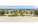Beachfront condos with a shared pool and manicured landscaping, and direct beach access at 2333 Gulf Of Mexico Dr # 1A2, Longboat Key, FL 34228