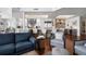 Spacious, modern kitchen with stainless steel appliances, white cabinetry, and a breakfast bar with seating at 2333 Gulf Of Mexico Dr # 1A2, Longboat Key, FL 34228