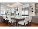 Modern kitchen featuring a large island with seating, stainless steel appliances, and ample counter space at 2333 Gulf Of Mexico Dr # 1A2, Longboat Key, FL 34228