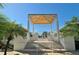 The community's entrance featuring a shady covered area and pool access at 2450 Harbourside Dr # 251, Longboat Key, FL 34228