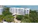 Stunning bayside condo with lush landscaping and covered entry at 2450 Harbourside Dr # 251, Longboat Key, FL 34228