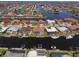 Waterfront neighborhood featuring homes along a canal with docks, boats, and screened-in pools on picturesque sunny day at 2817 La Mancha Ct, Punta Gorda, FL 33950