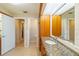 Bathroom with a large vanity with granite counters at 2817 La Mancha Ct, Punta Gorda, FL 33950