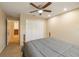 Bedroom features a ceiling fan, tile floors, and a large closet at 2817 La Mancha Ct, Punta Gorda, FL 33950