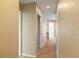 Hallway features neutral colored walls and tile flooring at 2817 La Mancha Ct, Punta Gorda, FL 33950