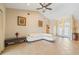 Inviting living area with vaulted ceilings, featuring a sectional sofa and a decorative entryway at 2817 La Mancha Ct, Punta Gorda, FL 33950
