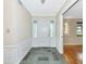 Inviting foyer with tile flooring and classic architectural details at 320 25Th W St, Bradenton, FL 34205