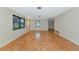 Bright living room with hardwood floors and large windows at 320 25Th W St, Bradenton, FL 34205