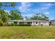 Spacious home with a large backyard and long screened in porch at 320 25Th W St, Bradenton, FL 34205