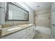 Bathroom featuring a double vanity with granite countertops at 3515 W Pearl Ave, Tampa, FL 33611
