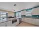 Kitchen featuring a functional island with stainless steel microwave and sink area. Great for hosting! at 3711 118Th W St, Bradenton, FL 34210