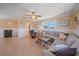 Comfortable living room with hardwood flooring, neutral paint, and cozy seating offers a relaxing and inviting atmosphere at 3711 118Th W St, Bradenton, FL 34210
