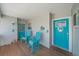 Inviting porch with two rocking chairs and coastal decor details at 3711 118Th W St, Bradenton, FL 34210
