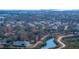 Aerial view showing neighborhood with mature trees and greenery with a waterway running along the backside of homes at 3847 30Th S Ave, St Petersburg, FL 33711