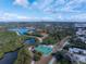 Community aerial view with tennis courts and nearby houses at 3847 30Th S Ave, St Petersburg, FL 33711