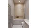 Modern bathroom showcasing a sleek bathtub with a built-in shower and minimalist design at 3847 30Th S Ave, St Petersburg, FL 33711