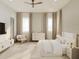 Spacious bedroom showcasing a ceiling fan, minimalist decor, and an abundance of natural light at 3847 30Th S Ave, St Petersburg, FL 33711