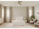 Inviting bedroom with a ceiling fan, neutral furniture, and natural light at 3847 30Th S Ave, St Petersburg, FL 33711