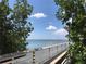 Scenic waterfront view with a walking pier, showcasing the peaceful coastal lifestyle at 3847 30Th S Ave, St Petersburg, FL 33711