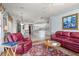 Cozy living room with view to kitchen and breakfast nook at 3859 Little Country Rd, Parrish, FL 34219